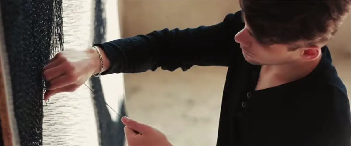 Artist working on Justin Timberlake string art