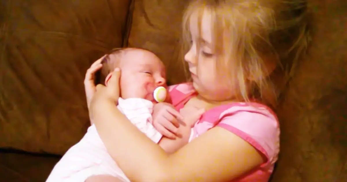 A 5yearold Handles Her Newborn Sister to Sleep Like an Adult