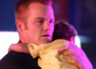 police-officer-comfort-baby