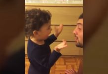 baby-argues-with-dad