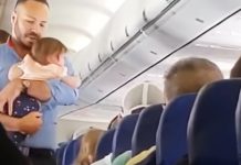 flight-attendant-calms-down-baby