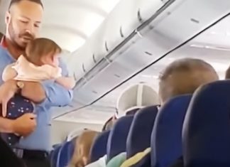 flight-attendant-calms-down-baby