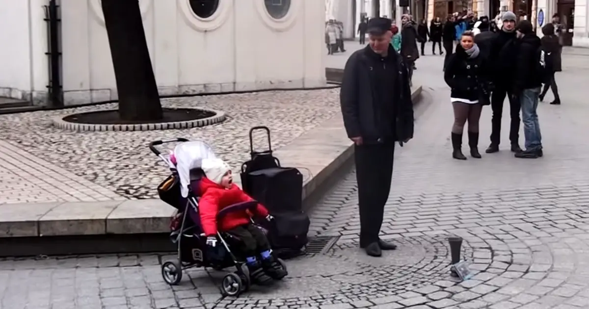 street-singer-and-baby