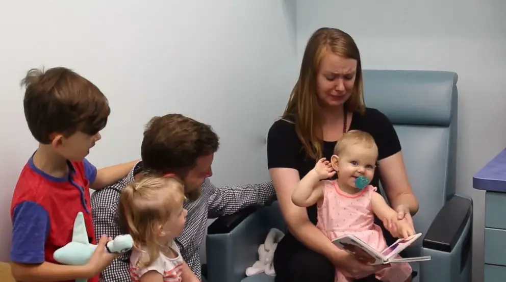 mom cries with hear implants