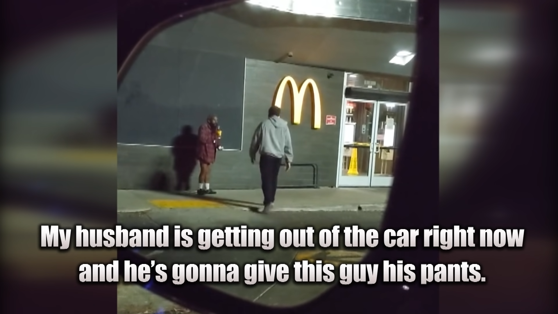 man-walks-up-to-homeless-man