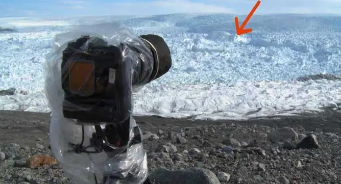 man-points-camera-ice