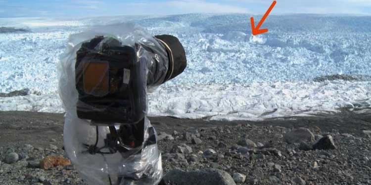 man-points-camera-ice