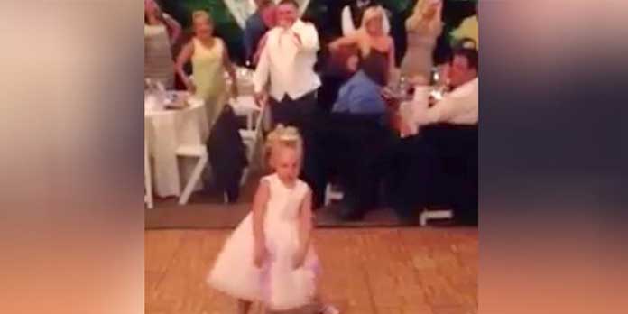 Cute Flower Girl Steals Spotlight With Her Moves During Wedding Reception