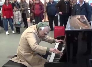 Masked man public piano