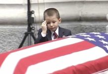 Heartbreaking moment boy salutes fallen airman