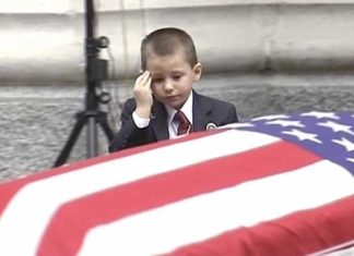 Heartbreaking moment boy salutes fallen airman