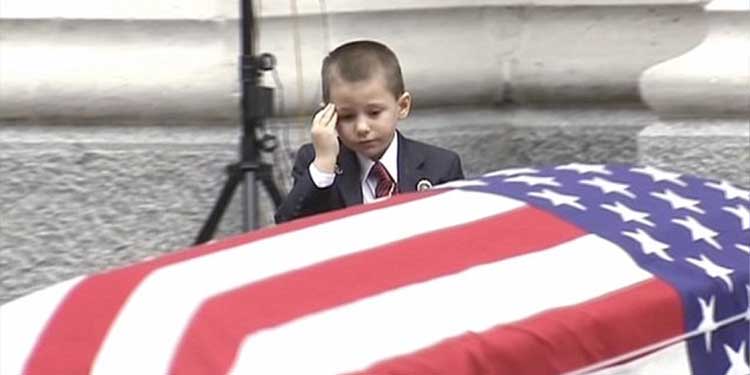 Heartbreaking moment boy salutes fallen airman