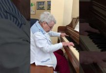 elderly woman with demntia perform piano