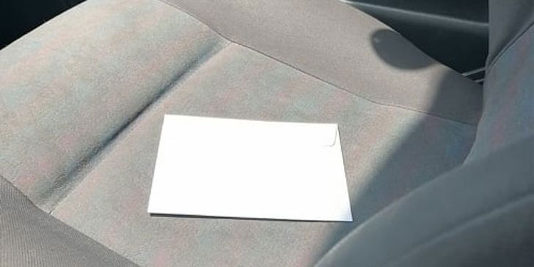 envelope in your car scam
